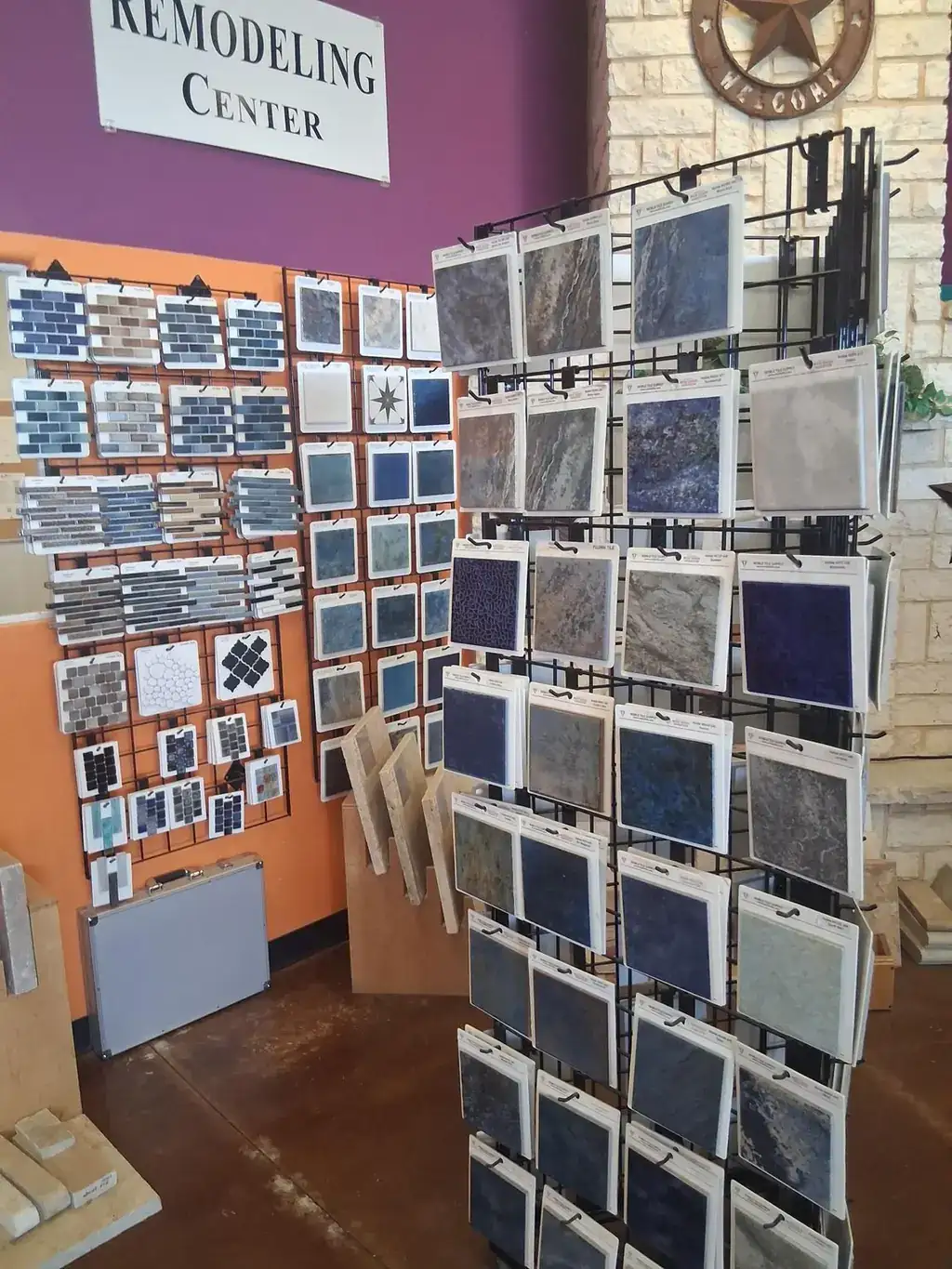 Racks of pool tile, stone and plaster samples in the remodeling center inside the Carrollton store